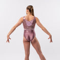 Load image into Gallery viewer, A gymnast in a pink leotard, viewed from the back, showcasing a glittery design
