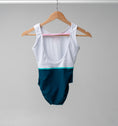 Load image into Gallery viewer, The back of a White and teal leotard hanging on a wooden hanger
