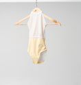 Load image into Gallery viewer, The front of the Felicity leotard hanging on a wooden hanger
