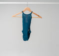 Load image into Gallery viewer, The front of the Jayda leotard hanging on a wooden hanger 
