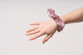 a close up of the Pink mauve scrunchie bow